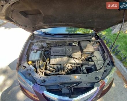 Мазда 3 2008 в Киеве на Automoto.ua Фиолетовый Мазда 3, объемом двигателя 1.6 л и пробегом 178 тыс. км за 5900 $, фото 12 на Automoto.ua