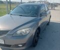 Коричневый Мазда 3, объемом двигателя 1.56 л и пробегом 380 тыс. км за 4600 $, фото 1 на Automoto.ua