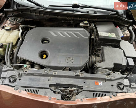 Коричневий Мазда 3, об'ємом двигуна 1.6 л та пробігом 235 тис. км за 7500 $, фото 12 на Automoto.ua