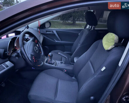 Коричневий Мазда 3, об'ємом двигуна 1.6 л та пробігом 235 тис. км за 7500 $, фото 15 на Automoto.ua