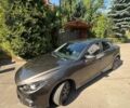 Коричневый Мазда 3, объемом двигателя 2 л и пробегом 178 тыс. км за 12800 $, фото 1 на Automoto.ua