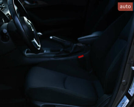 Коричневый Мазда 3, объемом двигателя 2 л и пробегом 196 тыс. км за 9000 $, фото 12 на Automoto.ua