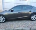 Коричневый Мазда 3, объемом двигателя 2 л и пробегом 180 тыс. км за 8999 $, фото 1 на Automoto.ua