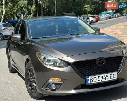 Коричневый Мазда 3, объемом двигателя 2 л и пробегом 142 тыс. км за 11700 $, фото 1 на Automoto.ua