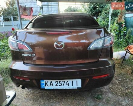 Коричневий Мазда 3, об'ємом двигуна 1.6 л та пробігом 65 тис. км за 9500 $, фото 30 на Automoto.ua