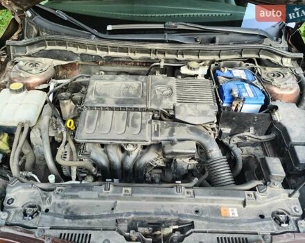 Коричневий Мазда 3, об'ємом двигуна 1.6 л та пробігом 65 тис. км за 9500 $, фото 26 на Automoto.ua