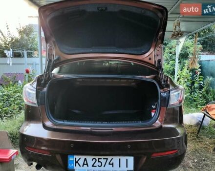 Коричневий Мазда 3, об'ємом двигуна 1.6 л та пробігом 65 тис. км за 9500 $, фото 29 на Automoto.ua