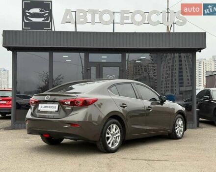 Коричневий Мазда 3, об'ємом двигуна 1.5 л та пробігом 246 тис. км за 11690 $, фото 3 на Automoto.ua