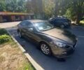Коричневый Мазда 3, объемом двигателя 2 л и пробегом 125 тыс. км за 9800 $, фото 1 на Automoto.ua