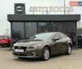 Коричневий Мазда 3, об'ємом двигуна 1.5 л та пробігом 246 тис. км за 11690 $, фото 4 на Automoto.ua