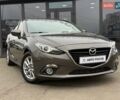 Коричневий Мазда 3, об'ємом двигуна 1.5 л та пробігом 246 тис. км за 11690 $, фото 1 на Automoto.ua