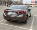 Коричневый Мазда 3, объемом двигателя 2 л и пробегом 279 тыс. км за 9599 $, фото 14 на Automoto.ua