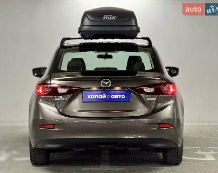 Мазда 3 2014 в Киеве на Automoto.ua Коричневый Мазда 3, объемом двигателя 2 л и пробегом 111 тыс. км за 9999 $, фото 5 на Automoto.ua