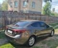 Коричневий Мазда 3, об'ємом двигуна 1.5 л та пробігом 171 тис. км за 12500 $, фото 2 на Automoto.ua