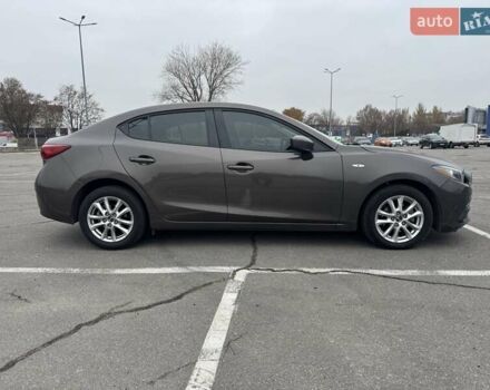 Коричневый Мазда 3, объемом двигателя 2 л и пробегом 175 тыс. км за 9999 $, фото 3 на Automoto.ua