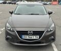 Коричневый Мазда 3, объемом двигателя 2 л и пробегом 175 тыс. км за 9999 $, фото 1 на Automoto.ua