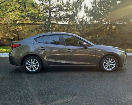 Коричневый Мазда 3, объемом двигателя 2 л и пробегом 175 тыс. км за 10400 $, фото 4 на Automoto.ua