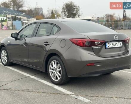 Коричневый Мазда 3, объемом двигателя 2 л и пробегом 175 тыс. км за 9999 $, фото 6 на Automoto.ua