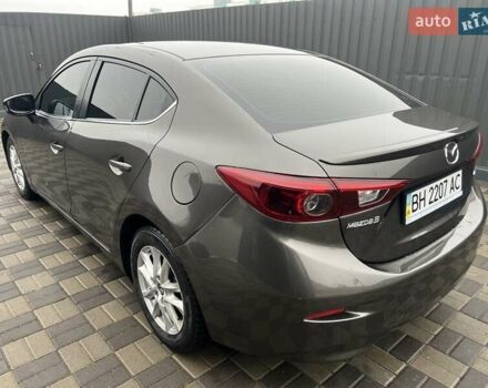 Коричневий Мазда 3, об'ємом двигуна 1.5 л та пробігом 94 тис. км за 12990 $, фото 17 на Automoto.ua