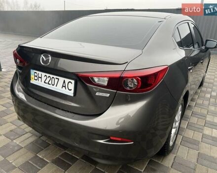 Коричневий Мазда 3, об'ємом двигуна 1.5 л та пробігом 94 тис. км за 12990 $, фото 21 на Automoto.ua