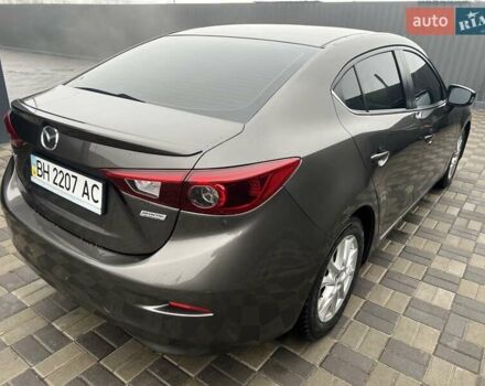 Коричневий Мазда 3, об'ємом двигуна 1.5 л та пробігом 94 тис. км за 12990 $, фото 25 на Automoto.ua