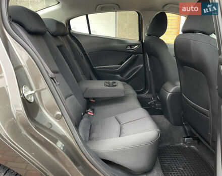 Коричневий Мазда 3, об'ємом двигуна 1.5 л та пробігом 98 тис. км за 15400 $, фото 34 на Automoto.ua