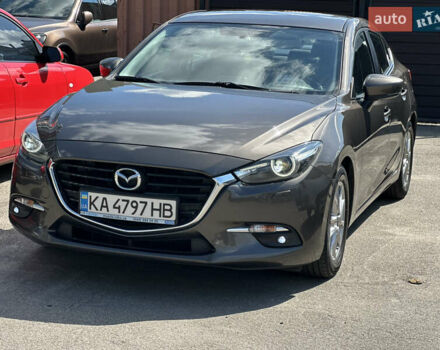 Коричневый Мазда 3, объемом двигателя 1.5 л и пробегом 98 тыс. км за 15900 $, фото 1 на Automoto.ua