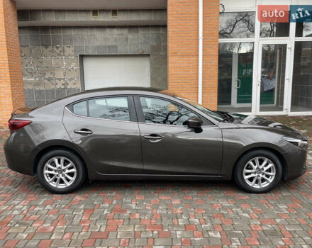 Коричневий Мазда 3, об'ємом двигуна 1.5 л та пробігом 98 тис. км за 15400 $, фото 4 на Automoto.ua