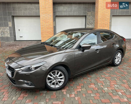 Коричневий Мазда 3, об'ємом двигуна 1.5 л та пробігом 98 тис. км за 15400 $, фото 8 на Automoto.ua