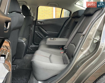 Коричневий Мазда 3, об'ємом двигуна 1.5 л та пробігом 98 тис. км за 15400 $, фото 27 на Automoto.ua