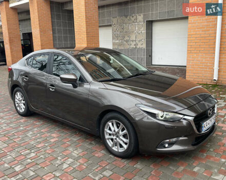 Коричневий Мазда 3, об'ємом двигуна 1.5 л та пробігом 98 тис. км за 15400 $, фото 12 на Automoto.ua