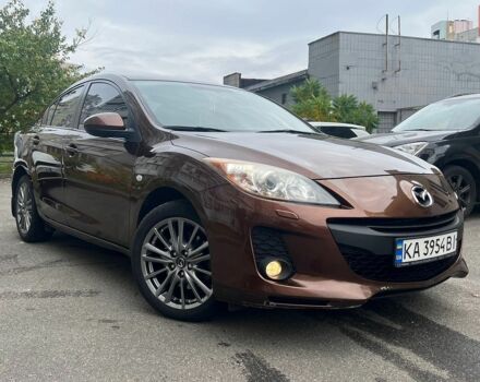 Коричневий Мазда 3, об'ємом двигуна 2 л та пробігом 135 тис. км за 9500 $, фото 1 на Automoto.ua