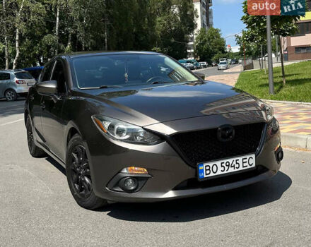 Коричневый Мазда 3, объемом двигателя 2 л и пробегом 142 тыс. км за 11700 $, фото 1 на Automoto.ua