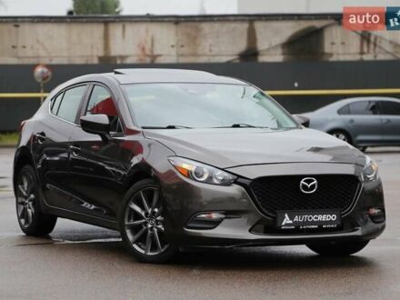 Коричневый Мазда 3, объемом двигателя 2.5 л и пробегом 129 тыс. км за 13500 $, фото 1 на Automoto.ua
