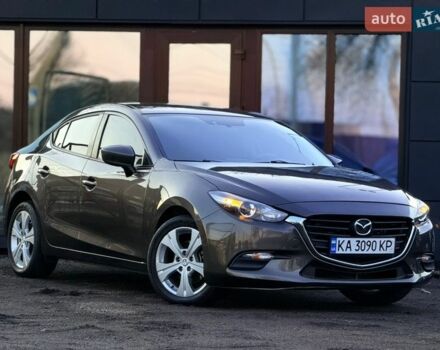 Коричневый Мазда 3, объемом двигателя 2 л и пробегом 192 тыс. км за 10600 $, фото 1 на Automoto.ua