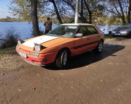 Червоний Мазда 3, об'ємом двигуна 1.6 л та пробігом 349 тис. км за 1202 $, фото 4 на Automoto.ua