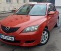 Красный Мазда 3, объемом двигателя 1.6 л и пробегом 159 тыс. км за 3398 $, фото 1 на Automoto.ua