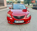 Красный Мазда 3, объемом двигателя 2 л и пробегом 222 тыс. км за 3999 $, фото 1 на Automoto.ua