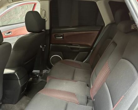 Красный Мазда 3, объемом двигателя 2 л и пробегом 210 тыс. км за 3500 $, фото 17 на Automoto.ua