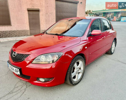 Красный Мазда 3, объемом двигателя 2 л и пробегом 222 тыс. км за 3999 $, фото 1 на Automoto.ua