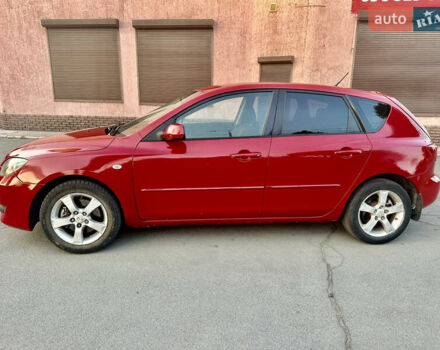 Красный Мазда 3, объемом двигателя 2 л и пробегом 222 тыс. км за 3999 $, фото 2 на Automoto.ua
