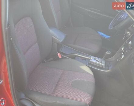 Червоний Мазда 3, об'ємом двигуна 1.6 л та пробігом 165 тис. км за 4850 $, фото 3 на Automoto.ua