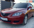 Красный Мазда 3, объемом двигателя 2 л и пробегом 250 тыс. км за 3900 $, фото 1 на Automoto.ua