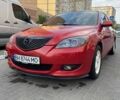 Красный Мазда 3, объемом двигателя 1.6 л и пробегом 304 тыс. км за 4500 $, фото 1 на Automoto.ua