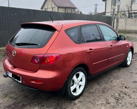 Червоний Мазда 3, об'ємом двигуна 1.6 л та пробігом 205 тис. км за 1999 $, фото 6 на Automoto.ua