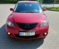 Красный Мазда 3, объемом двигателя 1.6 л и пробегом 179 тыс. км за 4700 $, фото 1 на Automoto.ua