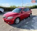 Красный Мазда 3, объемом двигателя 1.6 л и пробегом 280 тыс. км за 3199 $, фото 1 на Automoto.ua