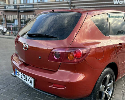 Червоний Мазда 3, об'ємом двигуна 1.6 л та пробігом 202 тис. км за 4899 $, фото 22 на Automoto.ua