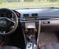 Красный Мазда 3, объемом двигателя 1.6 л и пробегом 293 тыс. км за 4799 $, фото 9 на Automoto.ua