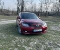Красный Мазда 3, объемом двигателя 1.6 л и пробегом 290 тыс. км за 5500 $, фото 1 на Automoto.ua